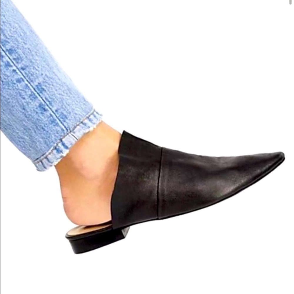 Black free people sienna leather ruffle flat mules.  Size 8